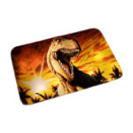Paillasson rectangulaire orangé avec une tête de dinosaure, fond blanc.