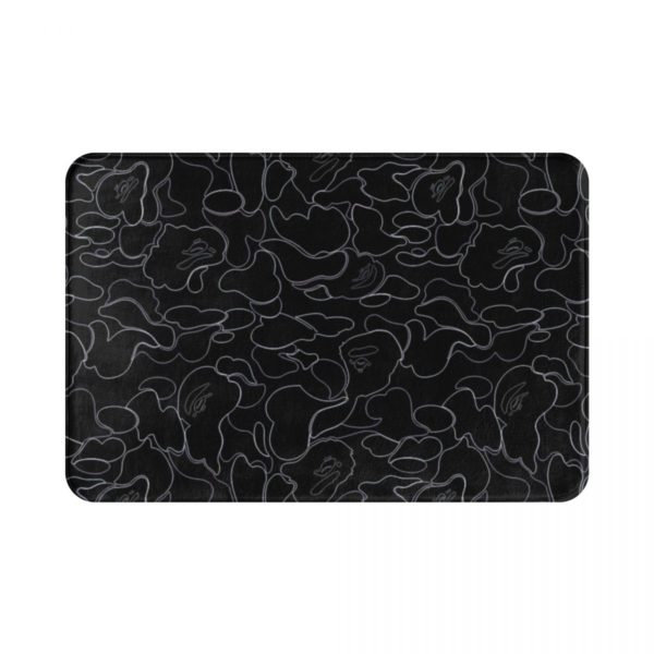 Paillasson noir imprimé de lignes blanches en motif abstraits