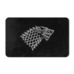 paillasson noir avec un dragon blanc de game of thrones